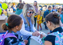  Volunteer handing out stickers